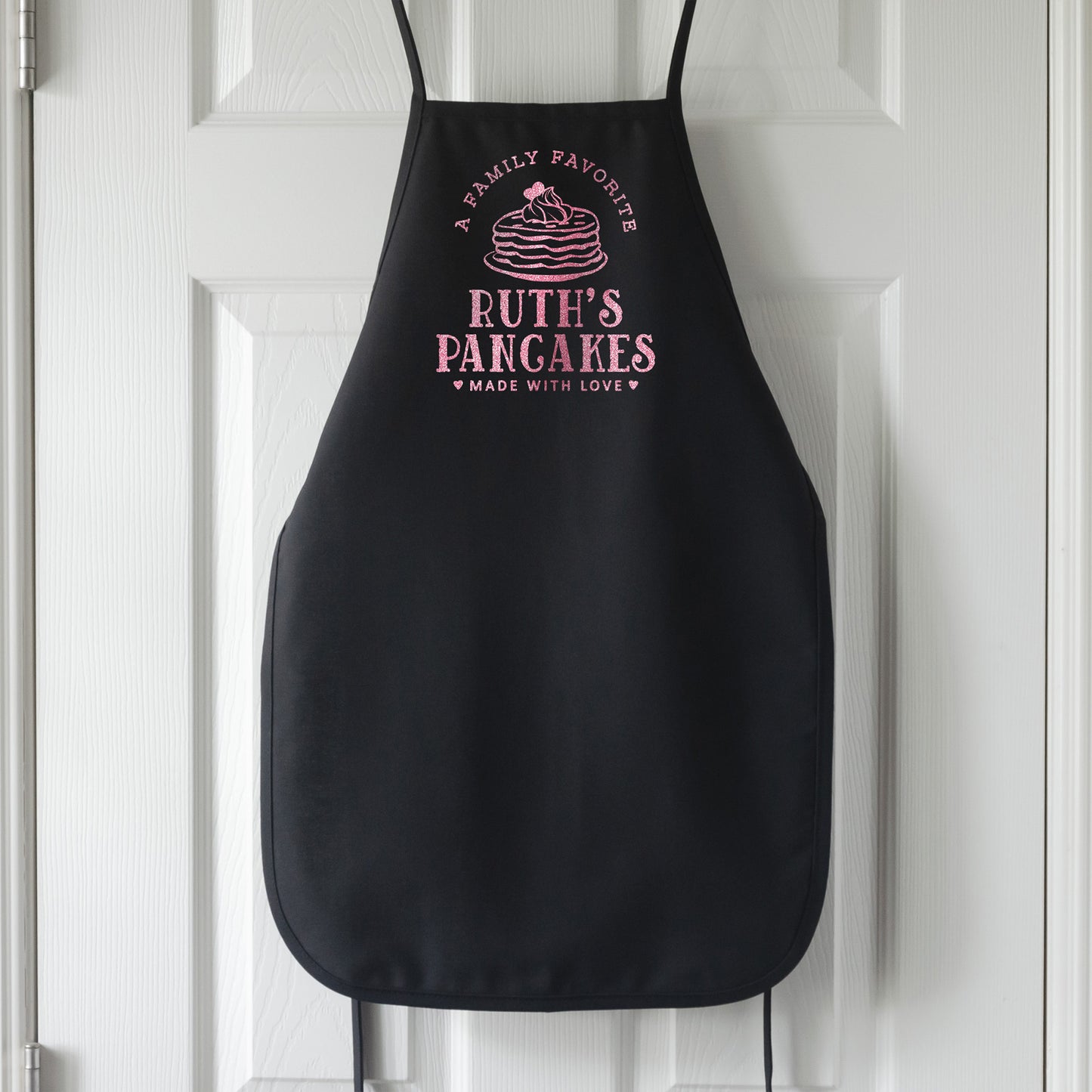 
                  
                    a personalized pancake apron in black
                  
                