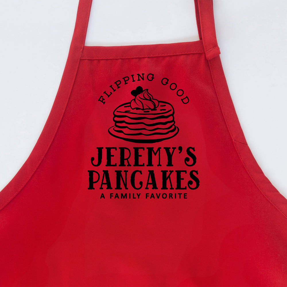
                  
                    a personalized pancake apron in red
                  
                