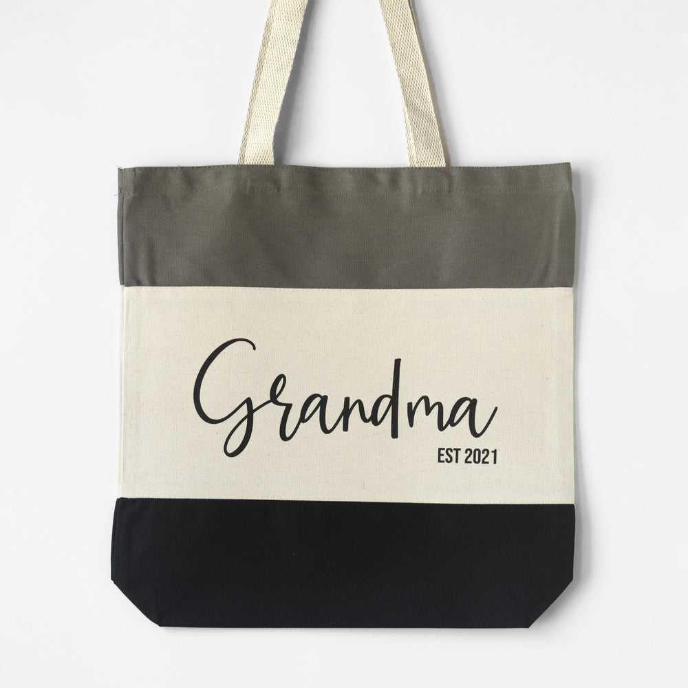 
                  
                    a personalized grandma name tote in black
                  
                