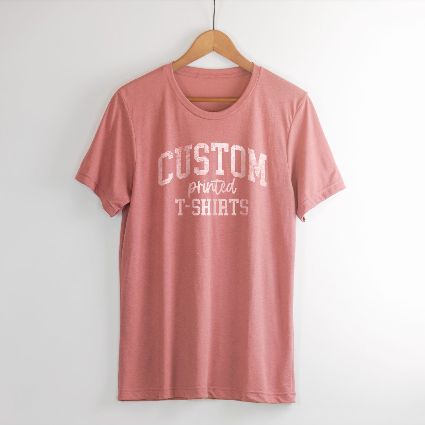 
                  
                    a hanging t-shirt in mauve
                  
                