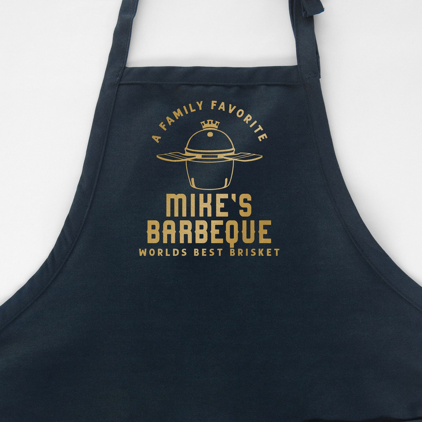 a personalized kamado grilling apron in navy