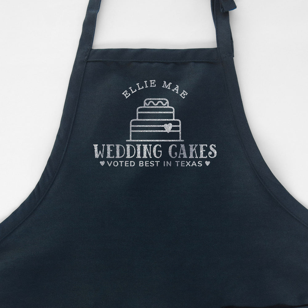 
                  
                    A personalized cake baking apron in navy
                  
                