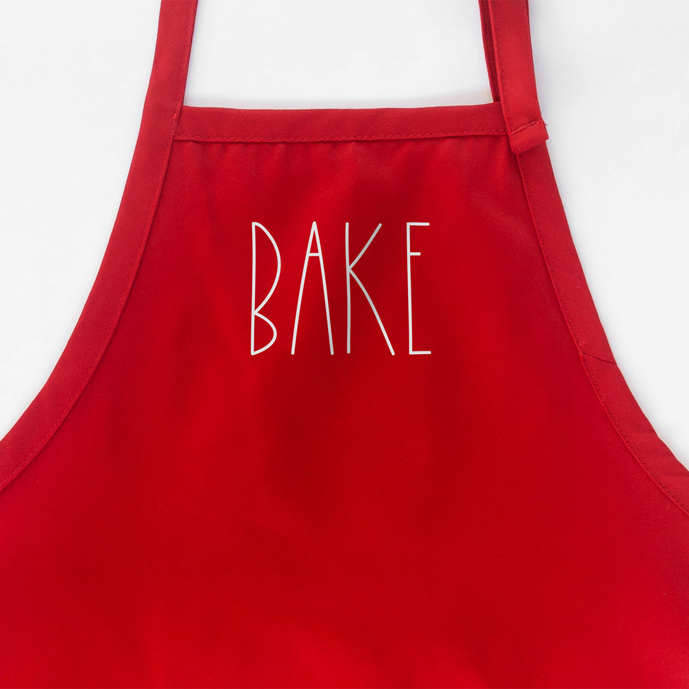 
                  
                    a Bake apron in red
                  
                