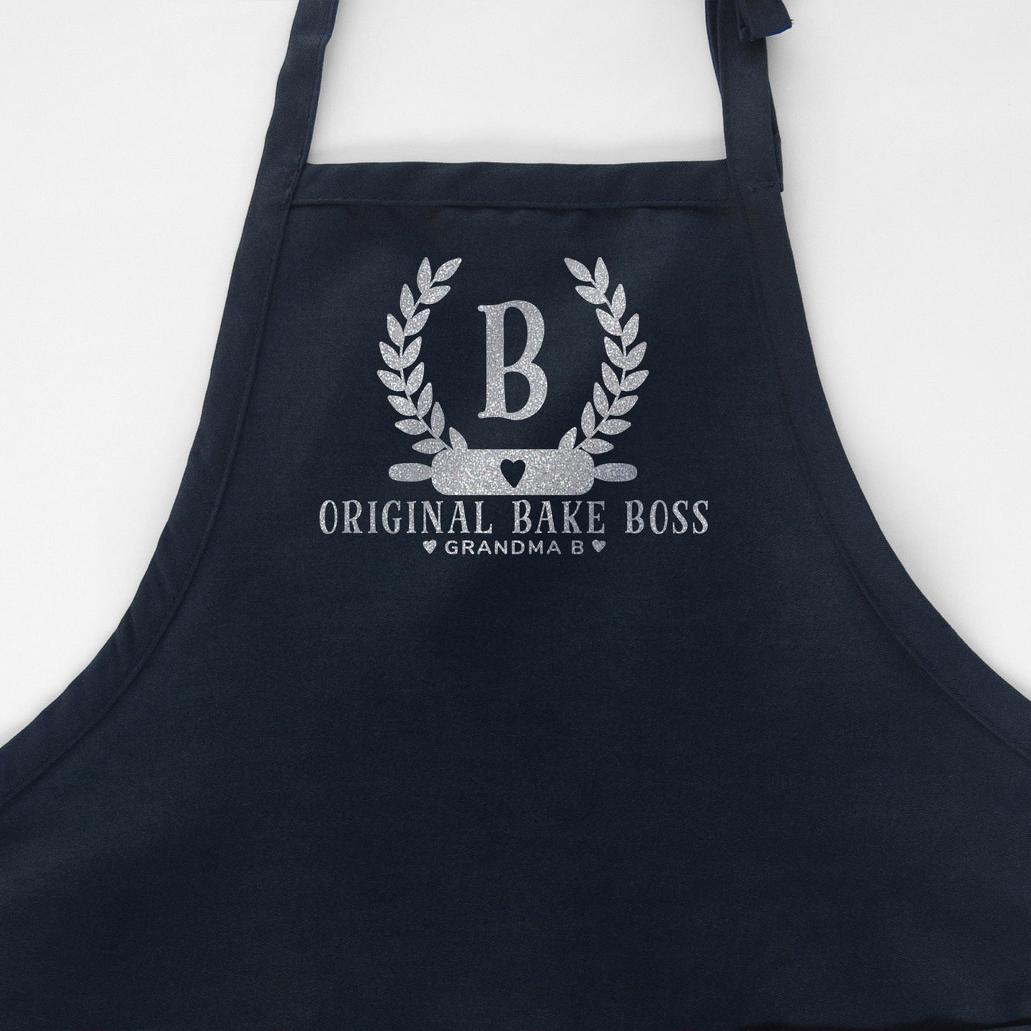 
                  
                    a personalized monogrammed baking apron in navy
                  
                