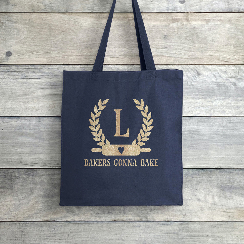 
                  
                    a personalized baking monogram tote in navy
                  
                