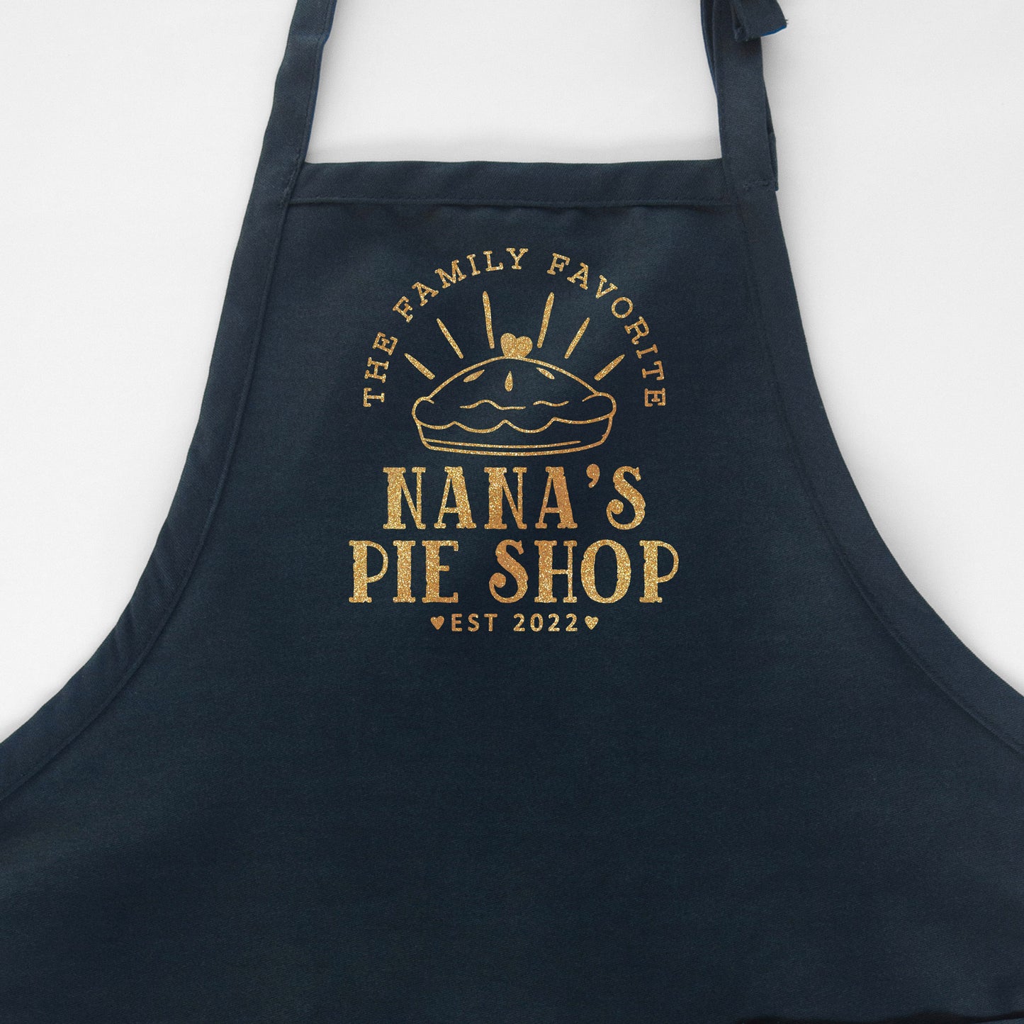 
                  
                    a personalized pie baking apron in navy
                  
                
