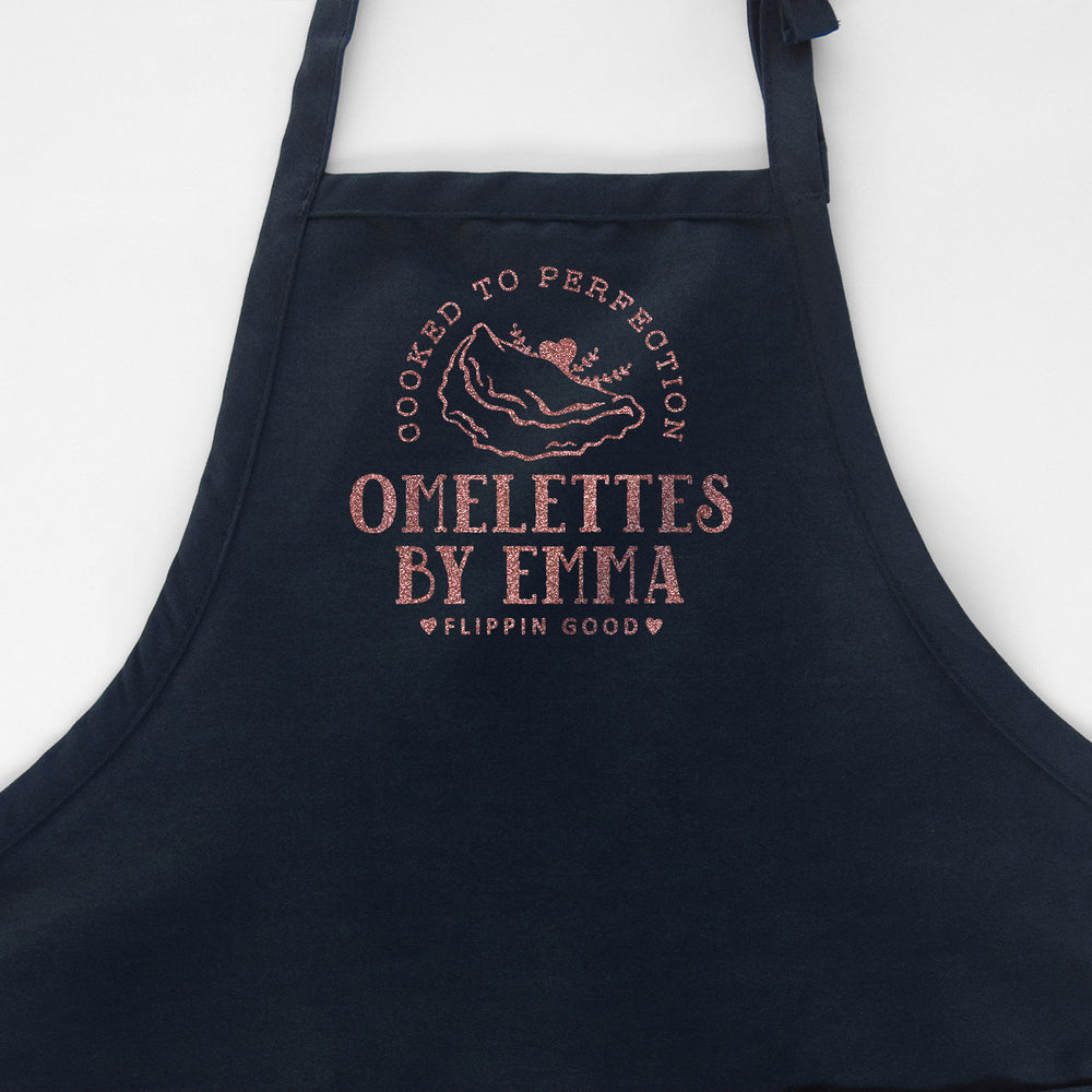 
                  
                    a personalized omelette apron in navy
                  
                
