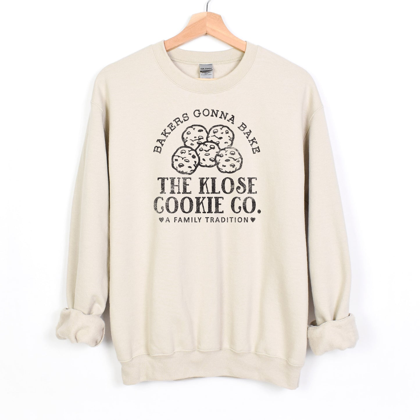 
                  
                    a personalized cookie baker sweatshirt in sand
                  
                