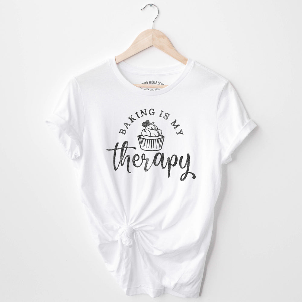 
                  
                    a baking is my therapy shirt in white
                  
                