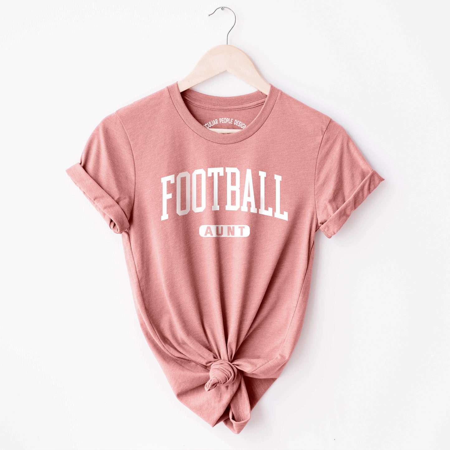 
                  
                     a football aunt shirt in mauve
                  
                