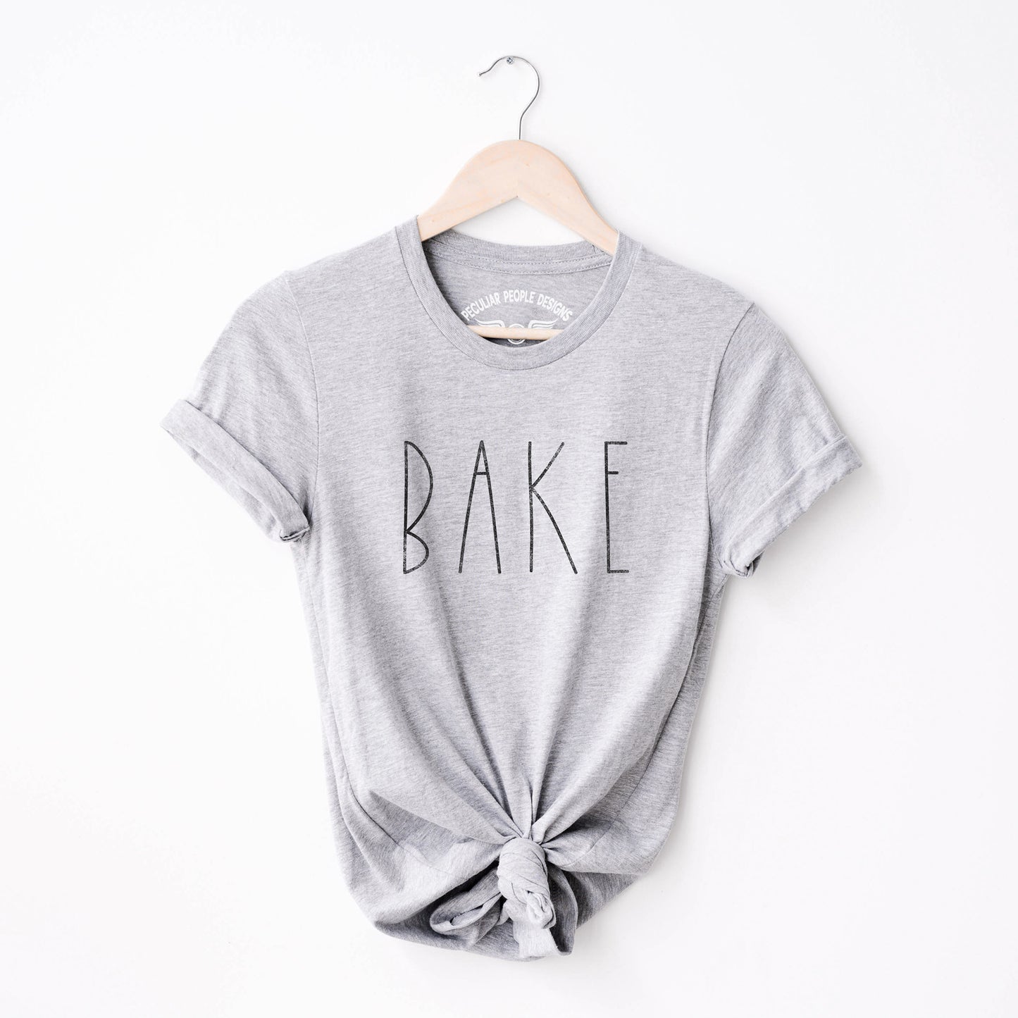 
                  
                    a bake shirt in grey
                  
                