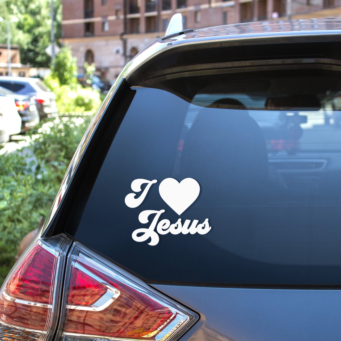 
                  
                    I Heart Jesus svg car decal on the rear window of a SUV
                  
                
