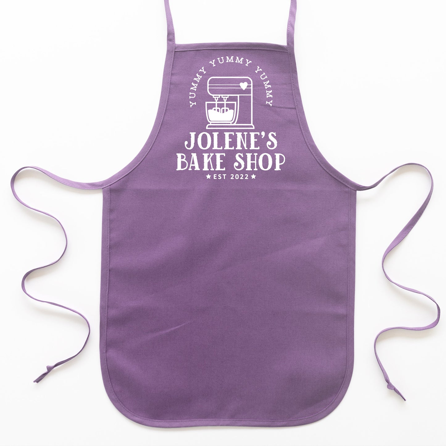 
                  
                    a toddler personalized baking apron in purple
                  
                