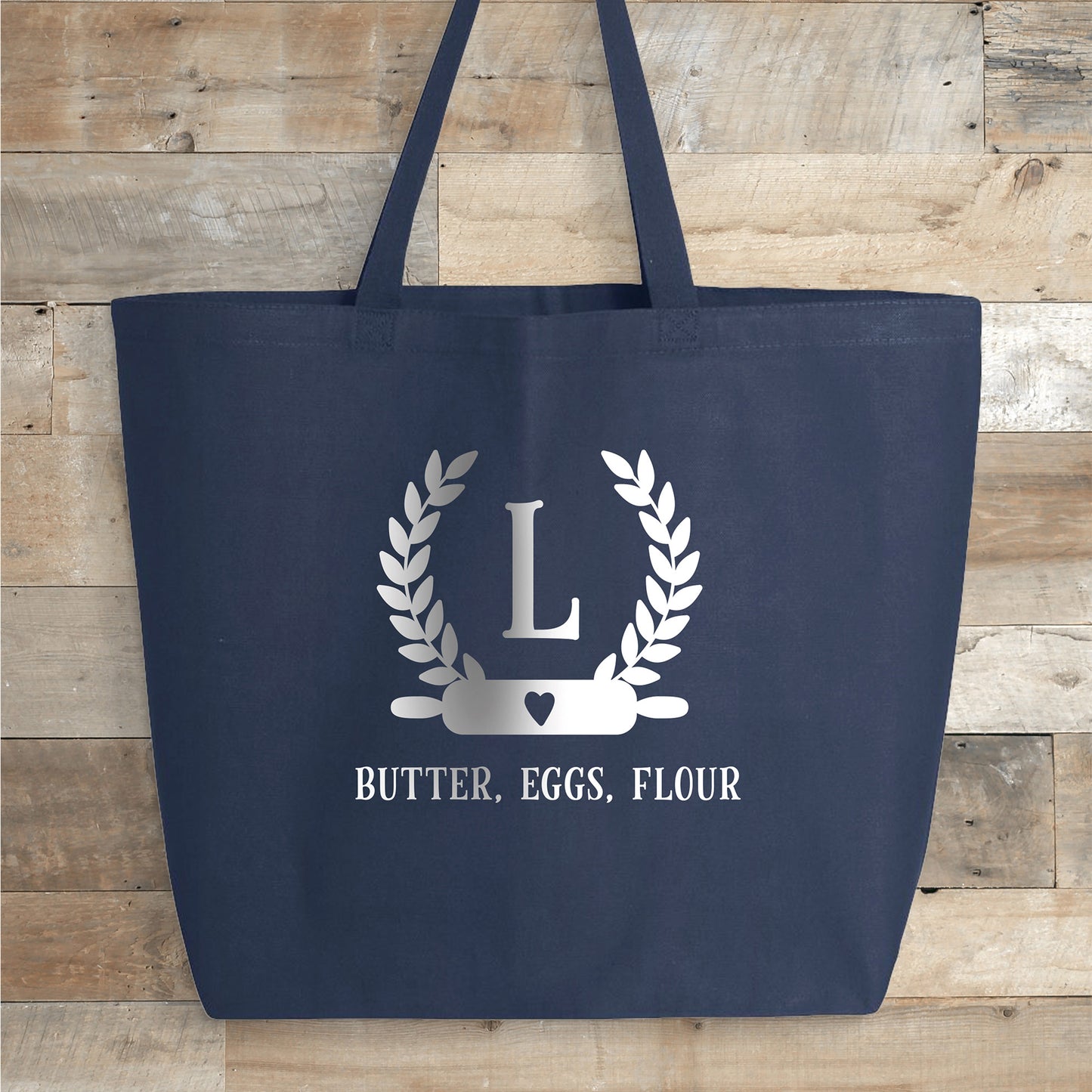 
                  
                    a jumbo personalized baking monogram tote in navy
                  
                
