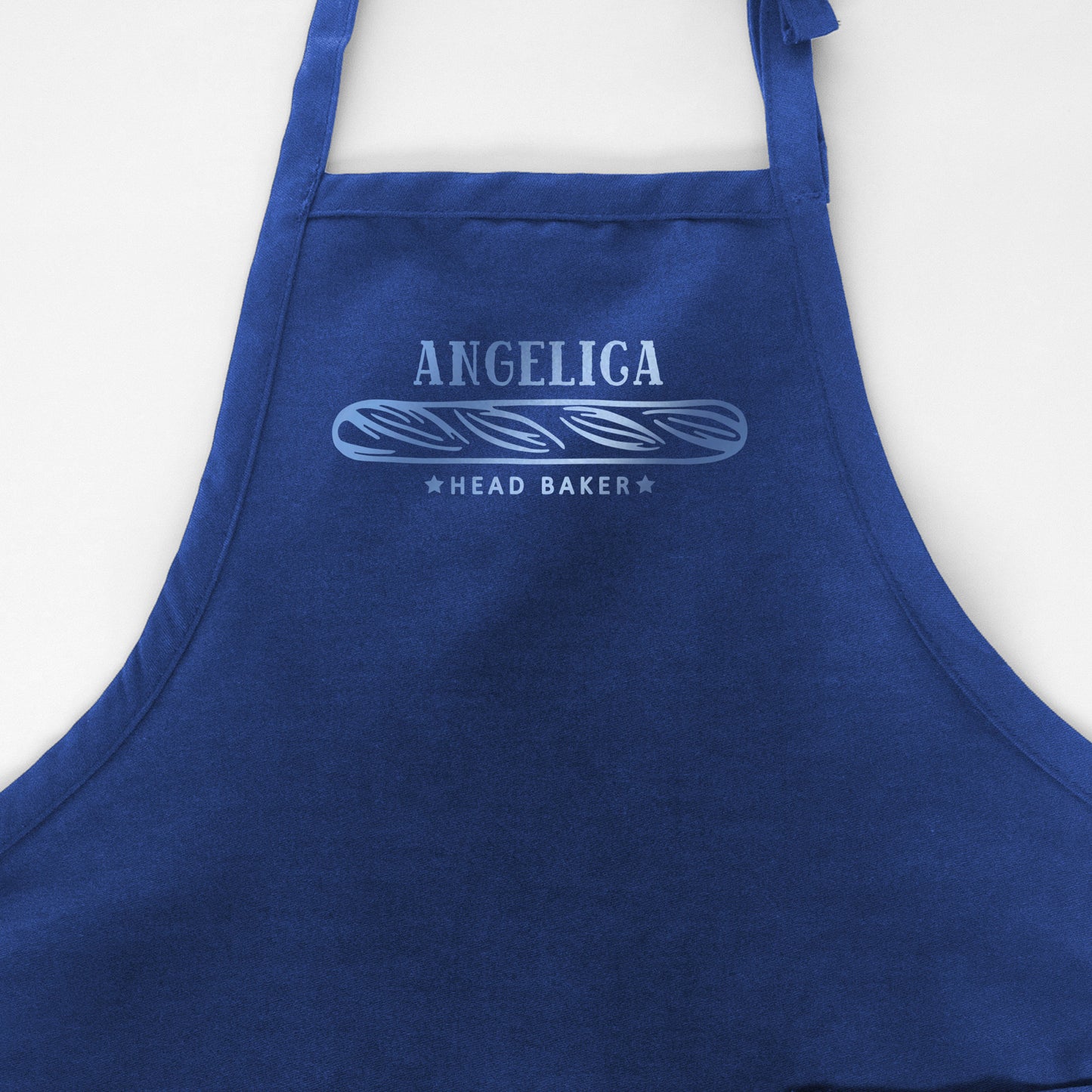 
                  
                    a personalized bread baking apron in royal
                  
                