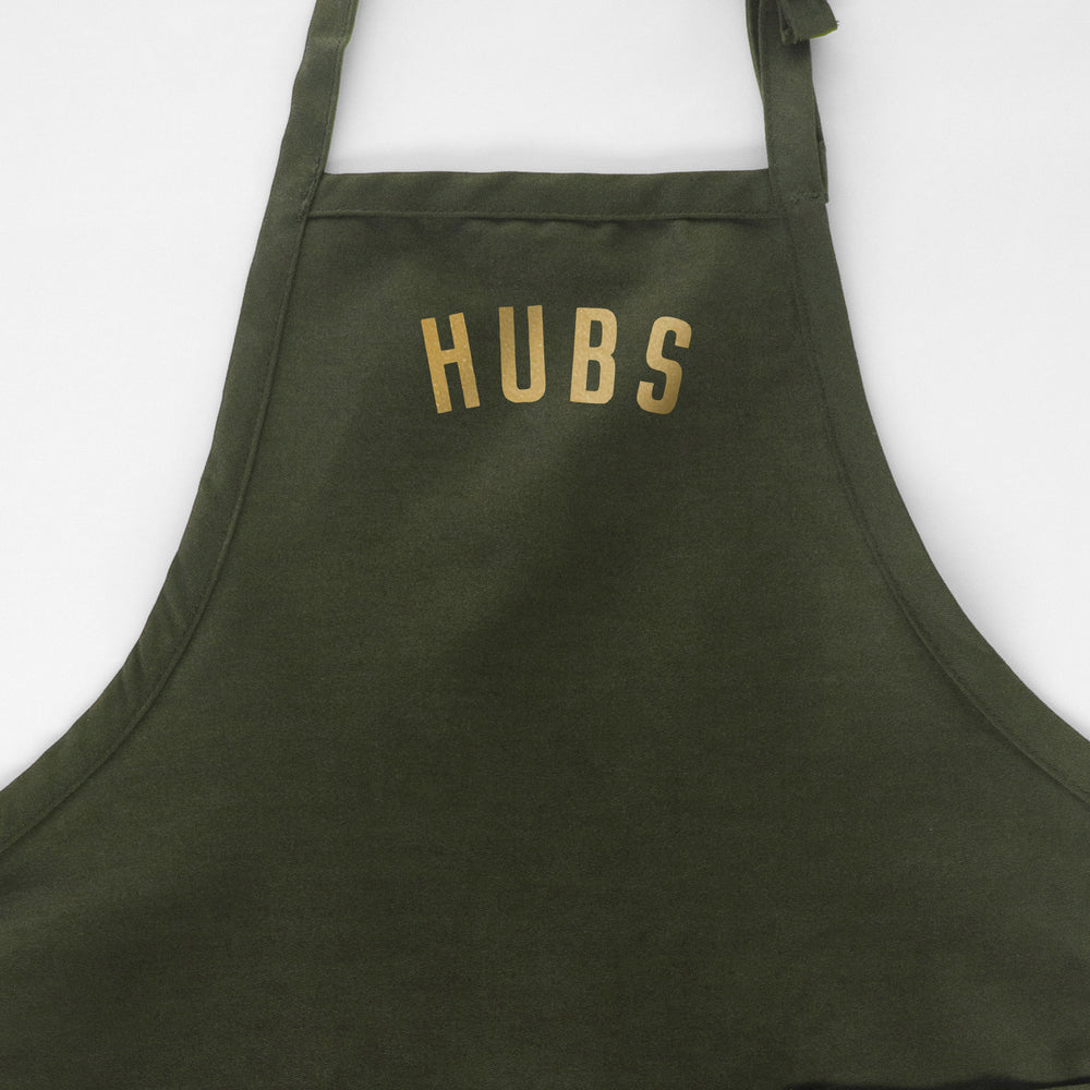 
                  
                    a personalized apron in green
                  
                