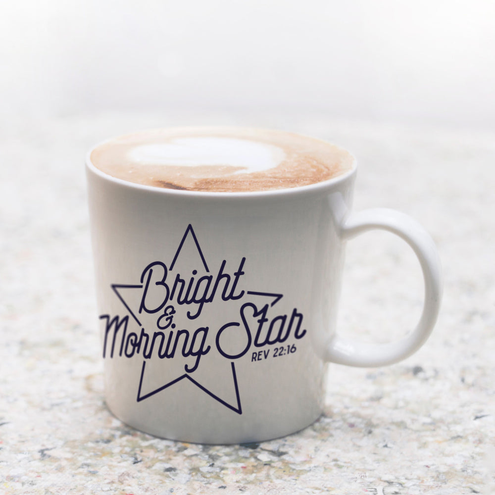 
                  
                    bright-morning-star-svg on a coffee cup, filled with coffee and steamed milk
                  
                