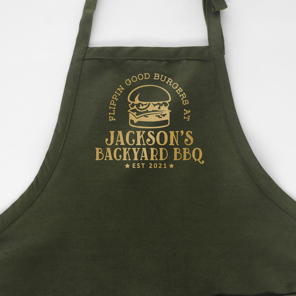 
                  
                    a personalized grilling apron in green
                  
                