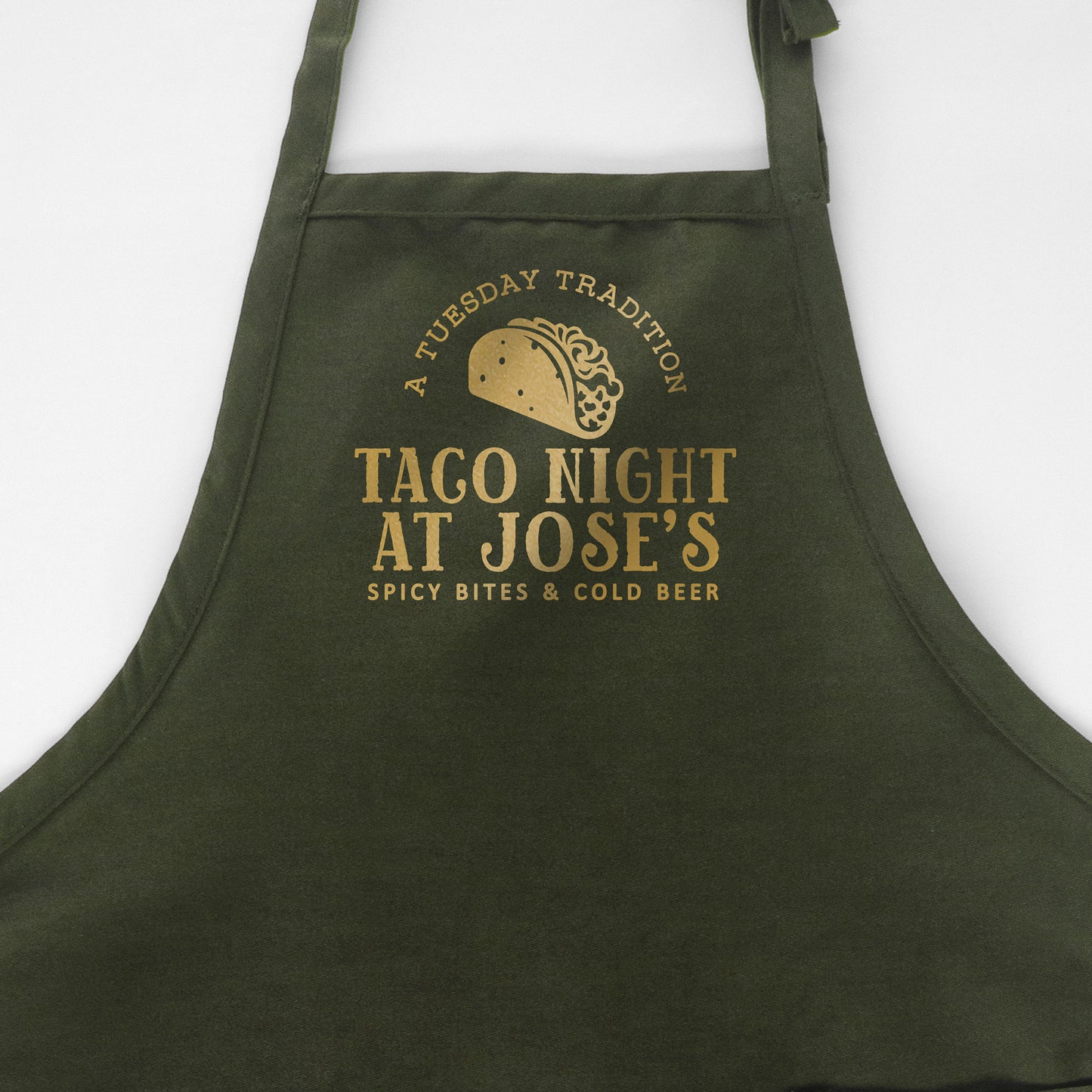 
                  
                    a personalized taco apron in green
                  
                