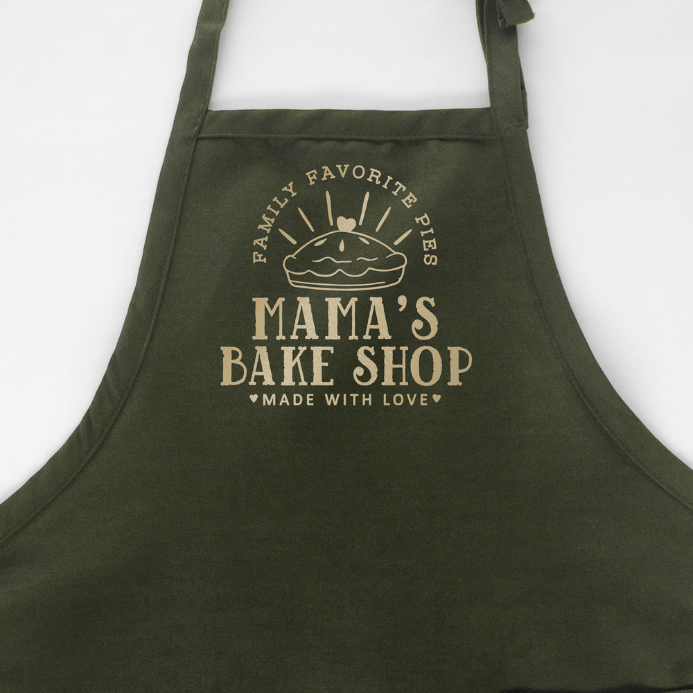 
                  
                    a personalized pie baking apron in green
                  
                