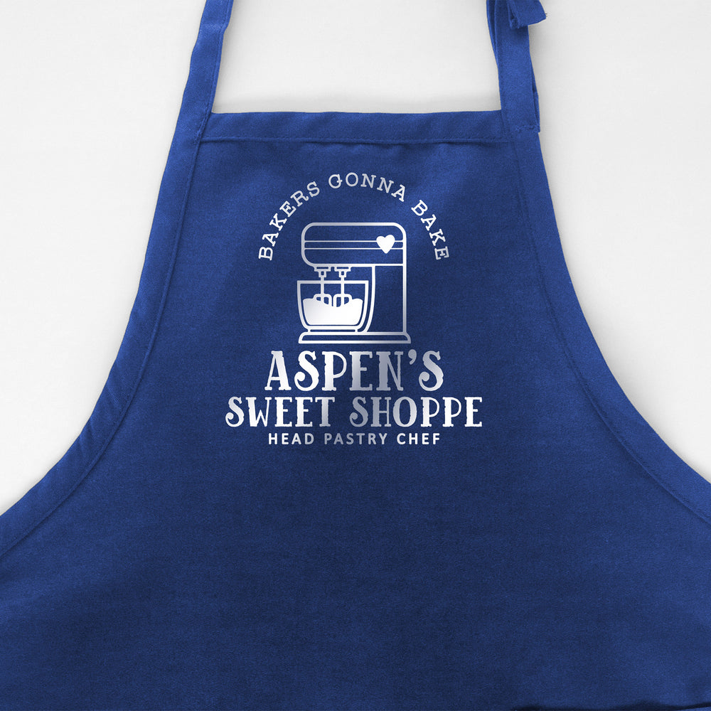 
                  
                    a personalized mixer apron in royal
                  
                