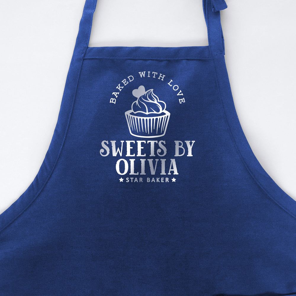 
                  
                    a personalized cupcake baking apron in royal
                  
                