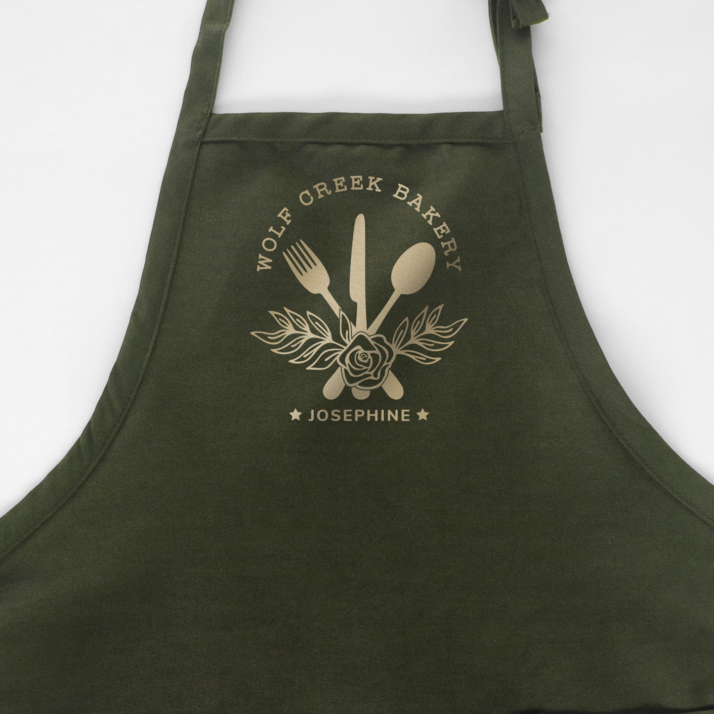 
                  
                    a personalized chef apron in green
                  
                
