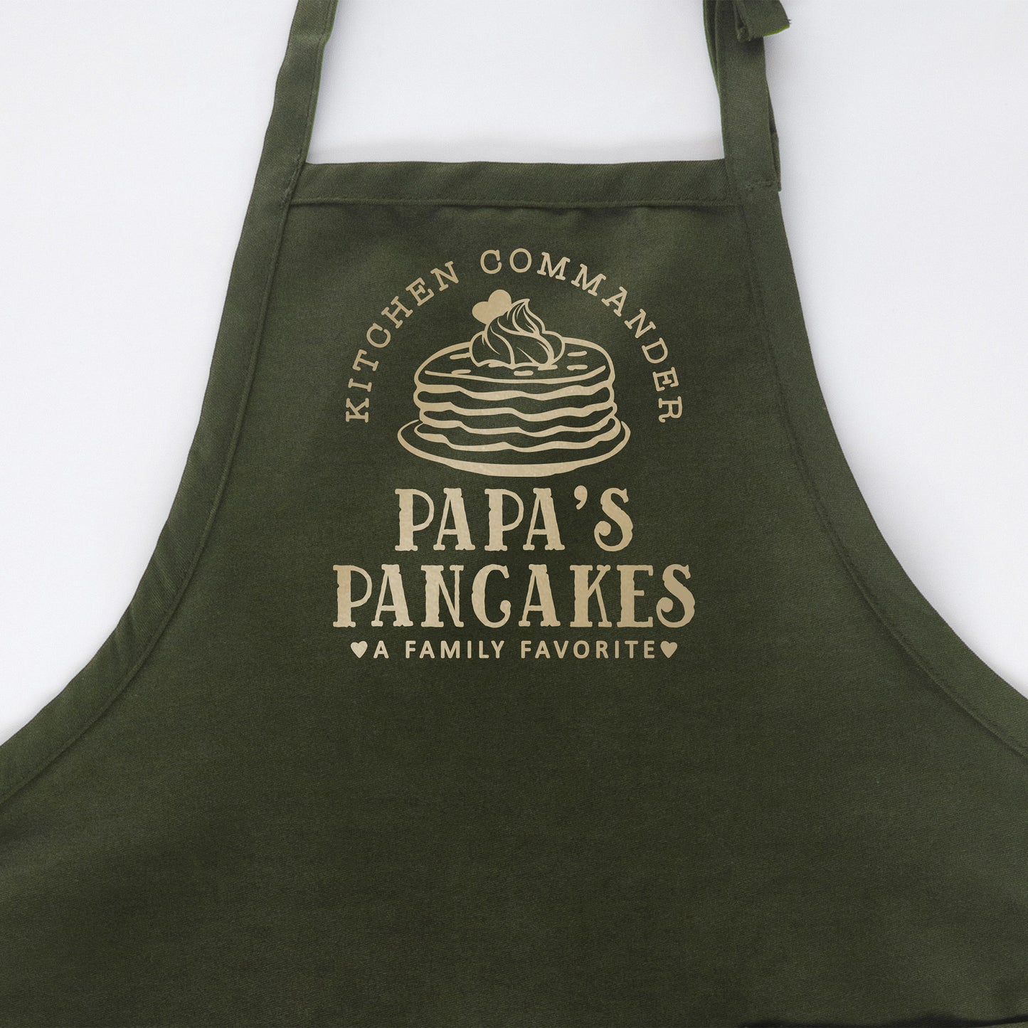 
                  
                    a personalized pancake apron in green
                  
                