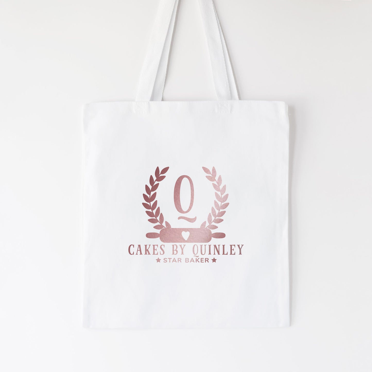 
                  
                    a personalized and monogrammed tote in white
                  
                