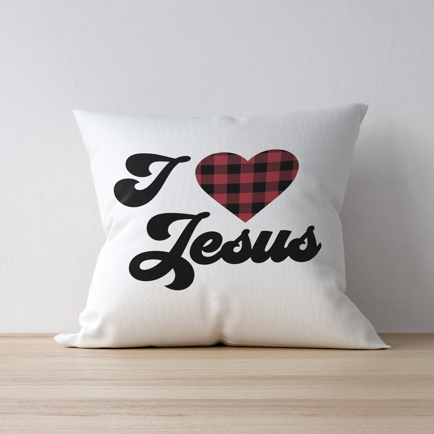 
                  
                    a white pillow printed with I Heart Jesus svg, buffalo plaid
                  
                