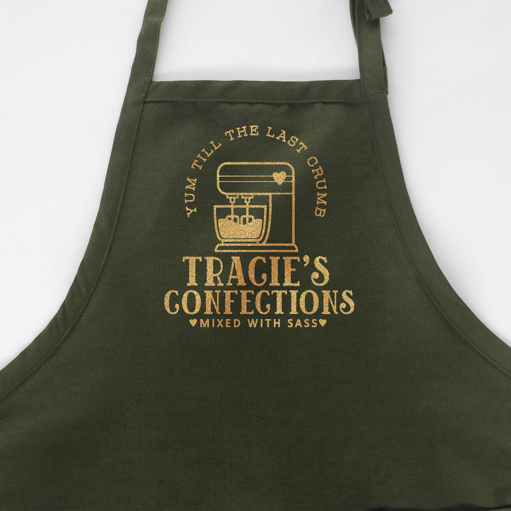
                  
                    a personalized mixer apron in green
                  
                